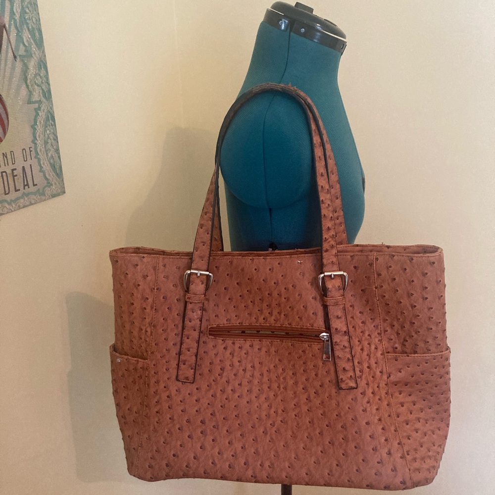Cute brown tote with some texture and a polka dot interior